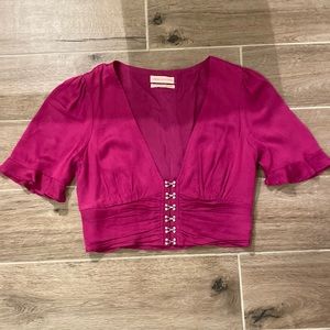 Urban Outfitters top size medium. A few tiny snags shown in last pictures.